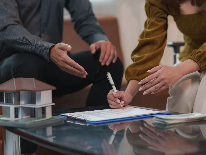 Consultant presenting a model to a client